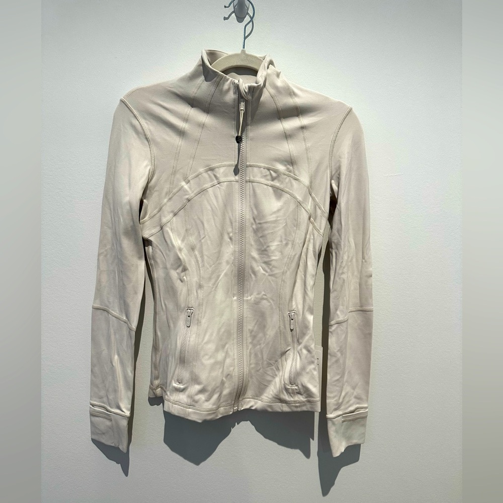 NWT Lululemon Define Nulu Jacket in the hot color Bone.